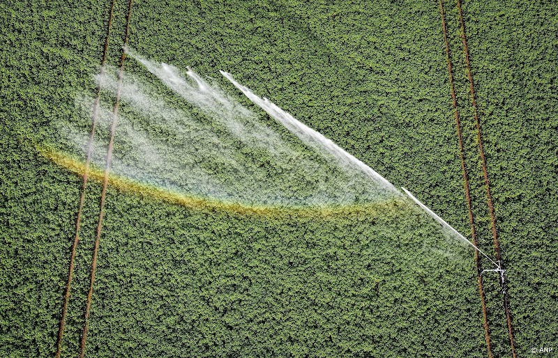 sproeien van land
